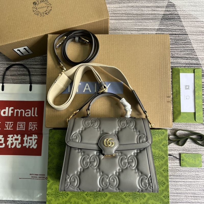 G*u*i top handle bags